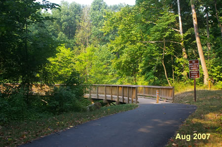The trail uses a short section of boardwalk to cross a wet area.