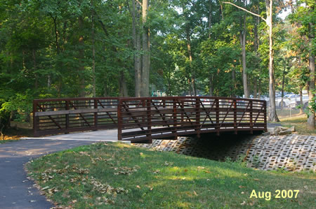 The trail crosses Sugarland Run on a bridge.