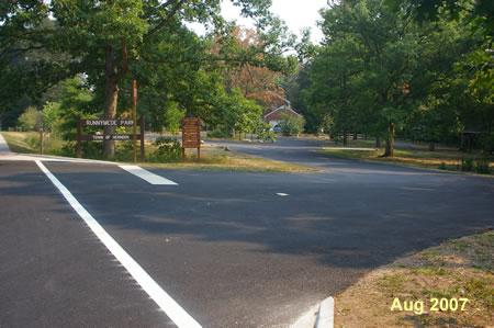 Turn right and follow the Runnymede Park entrance road.