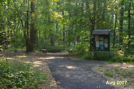 Turn left to follow the first intersecting trail in the woods.  Sugarland Run will be on your right.