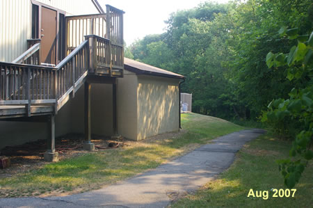 Follow the asphalt trail on the right side of the clubhouse.