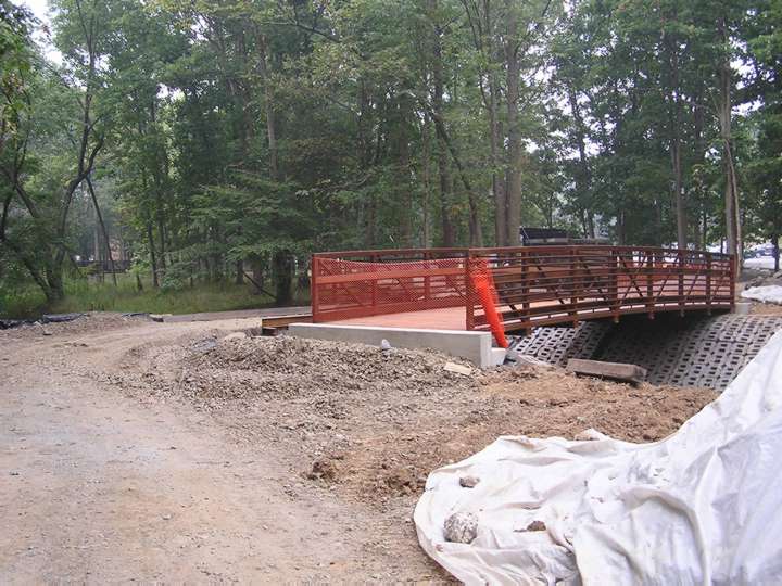 Trail bridge built on side of construction bridge but higher.