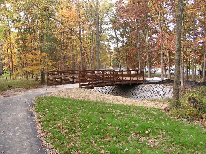 Construction bridge removed after paving done on eastern side of Sugarland Run.