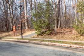 Turn right onto the asphalt trail at the entrance to South Lakes Park.