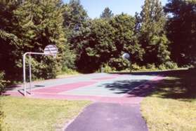 The trail passes through this basketball court.