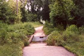 The trail crosses Sugarland Run on columns.