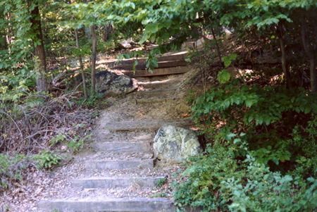 Start the walk on the stone steps near the end of the west view parking lot.
