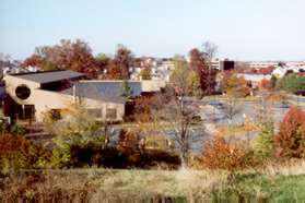 The sidewalk provides a good view to the west. The library is in the foreground.