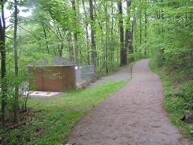 The trail passes a utility building.  Keep on the trail as it turns to the right.