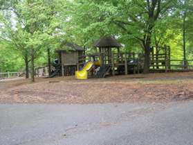 Continue past the trail leading to the left next to the playground area.