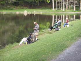The Pine Lake dam provides a good spot for catching fish.